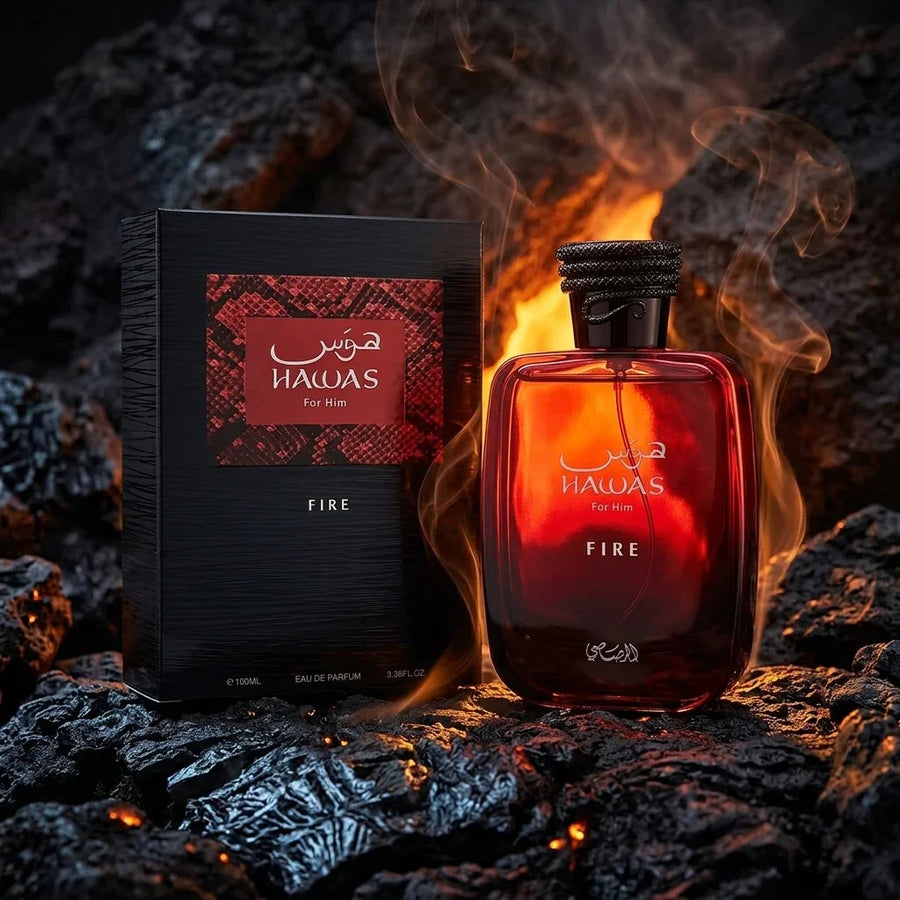 Hawas For Him Fire perfume bottle and packaging on black coals with visible flames