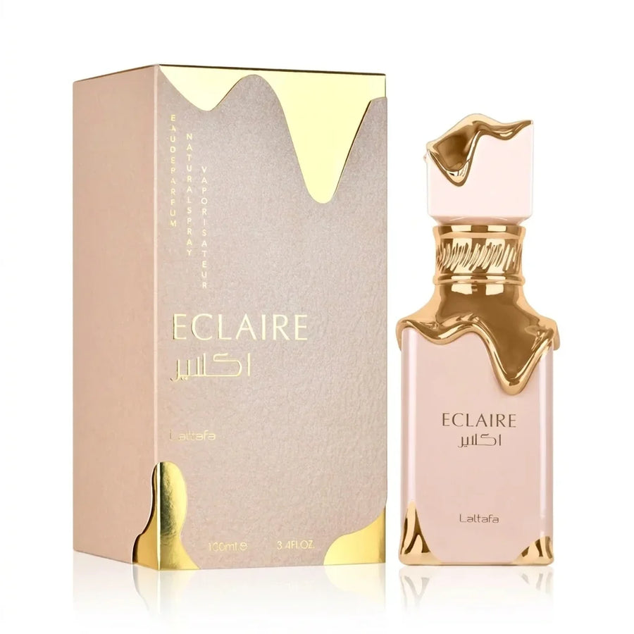 Eclaire perfume bottle with gold accents and matching gold-trimmed box, 100ml luxury fragrance.