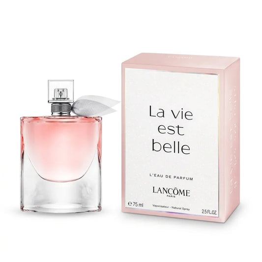 Luxury perfume bottle with pink liquid beside its matching box labeled 'La vie est belle'.