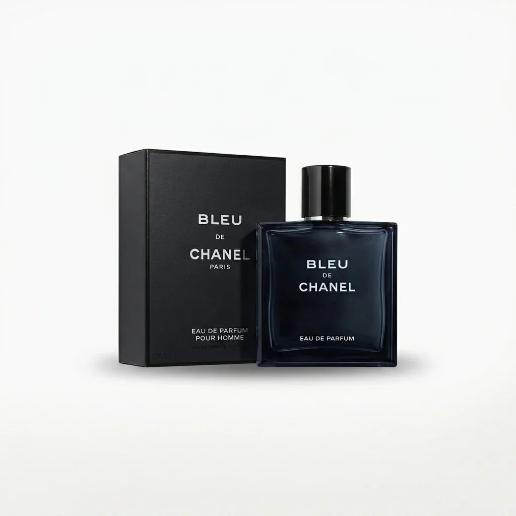 Blue square glass perfume bottle and matching box on white background, luxury fragrance for men