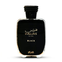 Hawas For Him Black perfume bottle with gold lettering on black glass
