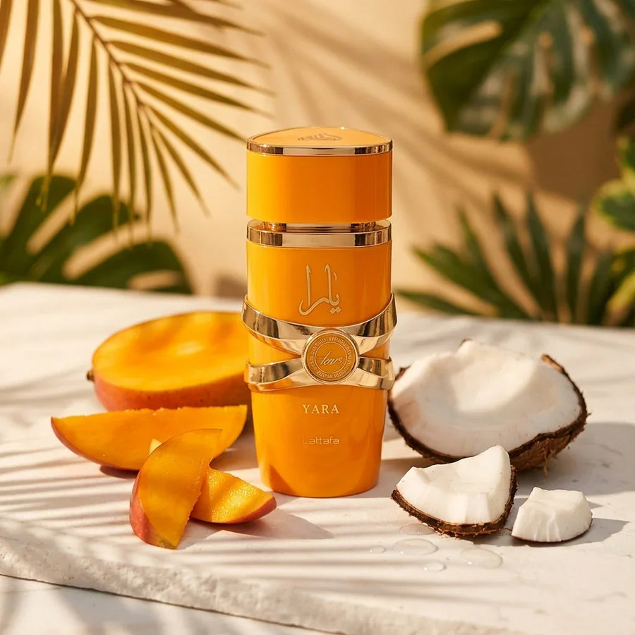 Yara Lattafa perfume bottle with fresh mango and coconut, tropical luxury fragrance