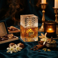 Luxurious Lattafa Khamrah perfume bottle with chocolates, flowers, spices, and candles on velvet